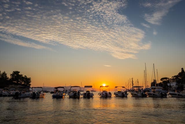 Sunrise picture of the boats in the harbour in Loggos on the lovely island of Paxos by Rick McEvoy photography