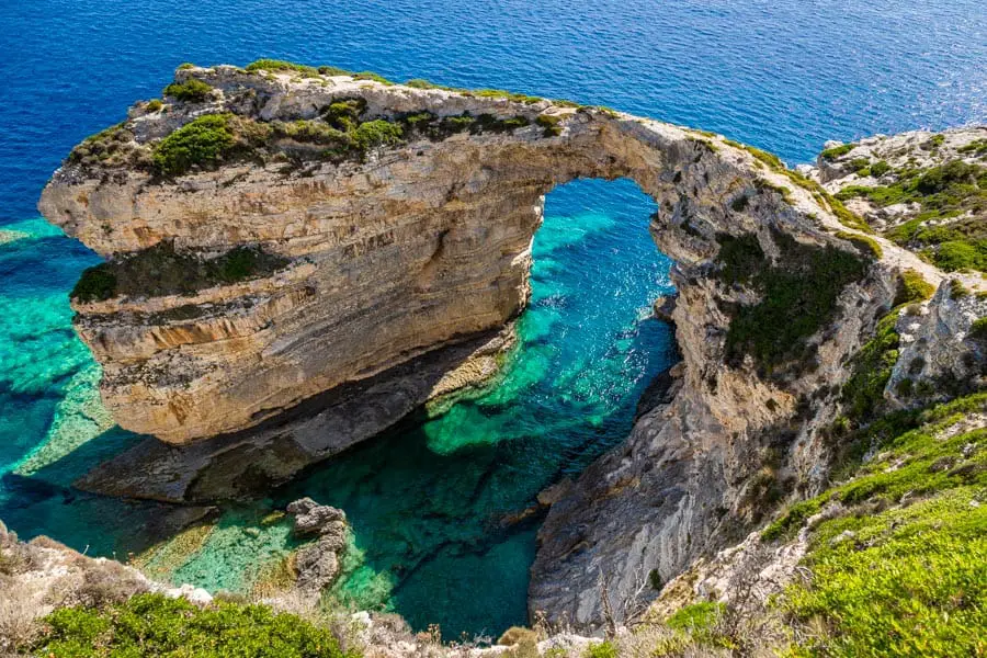 The Tripitos Arch is one of the most popular tourist attractions on the Greek Island of Paxos