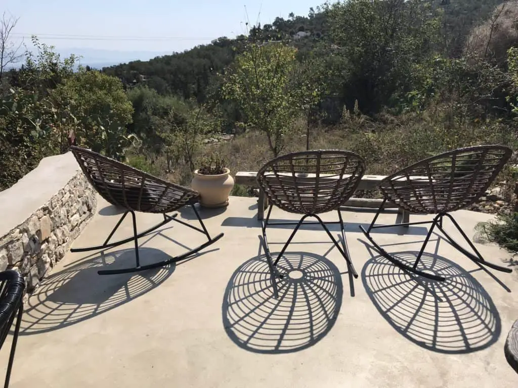 Seats with a view at Averto Day and Night Yard on Paxos